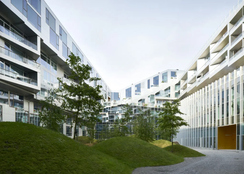 Planted courtyard between the residential and office wings of the 8 House in Ørestad