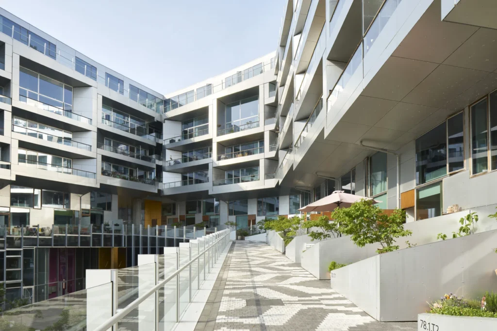 Cascading green terraces on the south-west slope of the 8 House in Ørestad