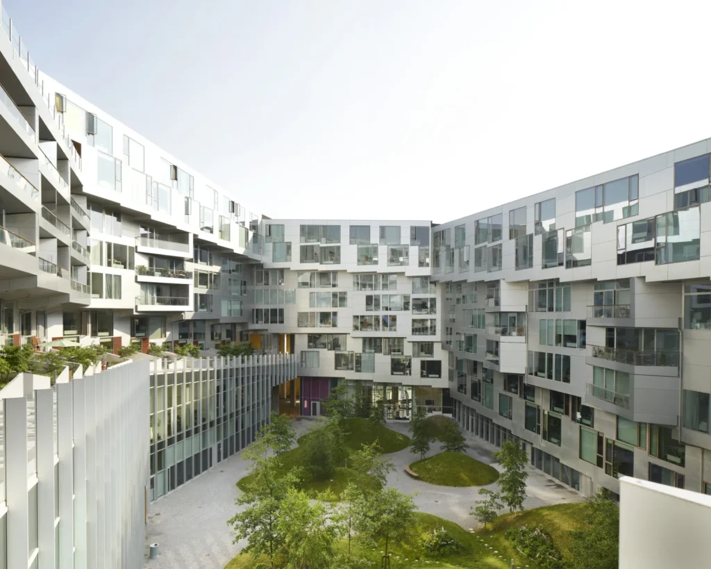 Inner courtyard of the 8 House looking up at stacked balconies in Ørestad