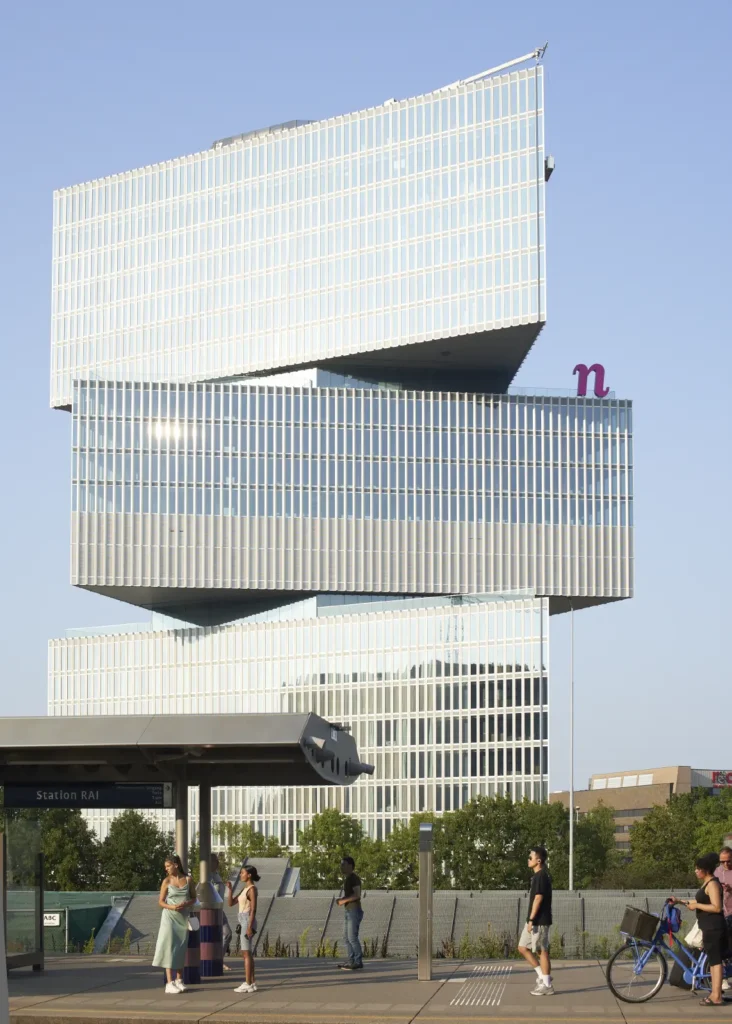 nHow Amsterdam RAI Hotel by OMA seen from railway platform at RAI station
