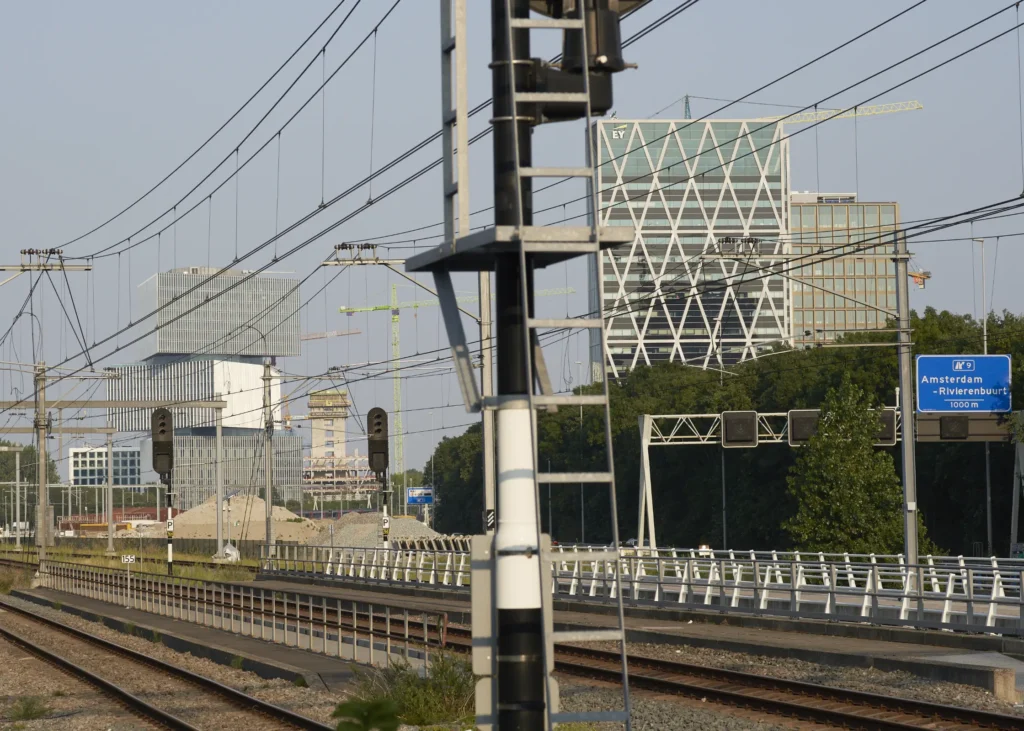 nHow Amsterdam RAI Hotel by Rem Koolhaas/ OMA seen from railway line
