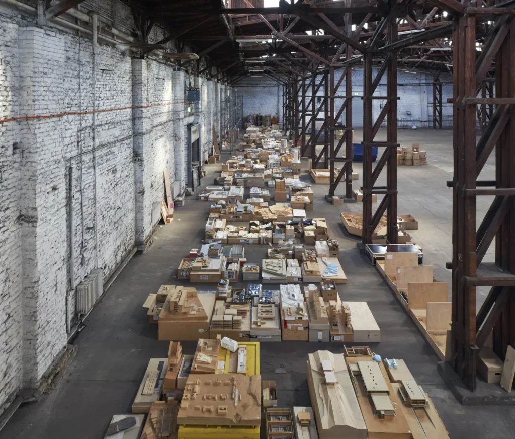 Aerial photograph of hundreds of cardboard and plaster models laid out for Barkow Leibinger exhibition