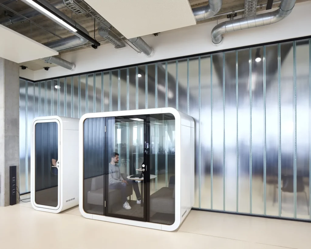Phone booth pod in open office space at UP! Berlin