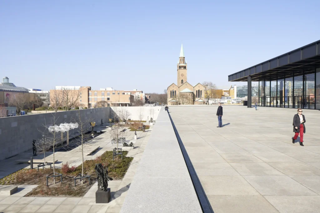 Sculpture garden with artworks below the podium of the Neue Nationalgalerie