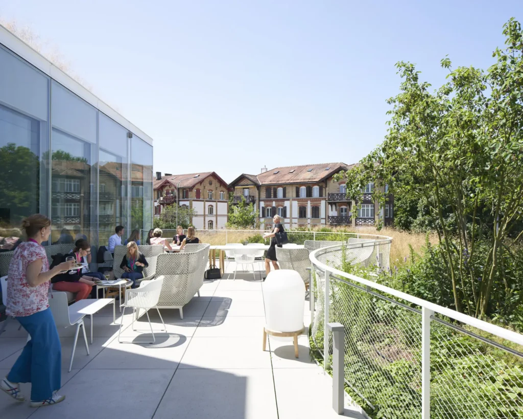 Green terrace of the SQUARE Learning Center overlooking St. Gallen and the surrounding hills