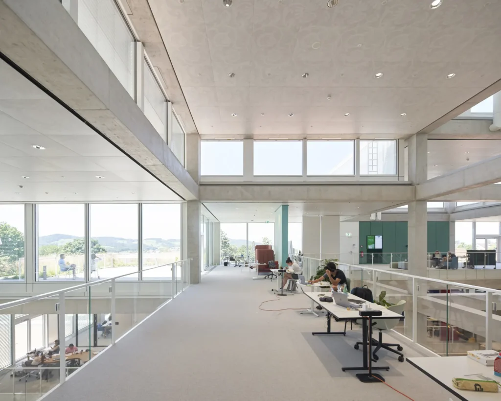 Students working in the open-plan learning space of the SQUARE Learning Center