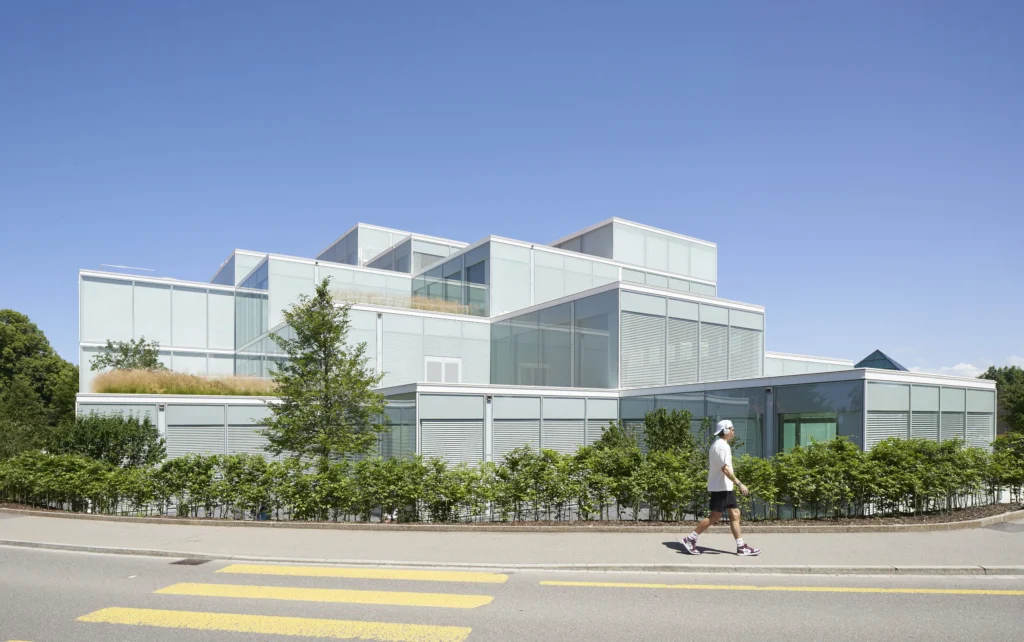 Pedestrians walking past the SQUARE Learning Center at the University of St. Gallen