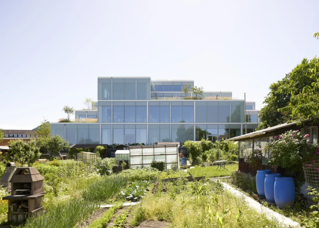 SQUARE Learning Center seen through the small private gardens towards the University of St. Gallen campus