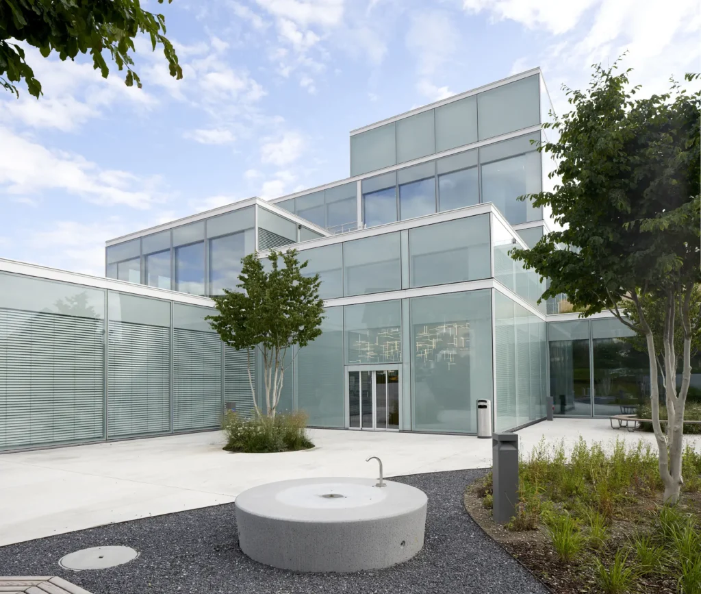 Glass facade with solar louvers at the SQUARE Learning Center by Sou Fujimoto