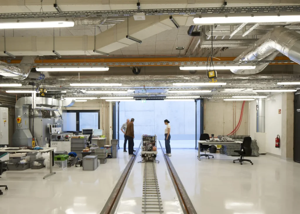 Testing laboratory with rail tracks and open doors inside the KMAC in Aachen