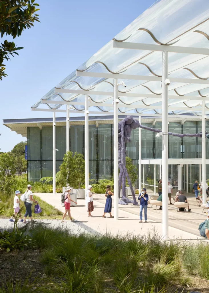 Outdoor café terrace with visitors at Sydney Modern art gallery by SANAA