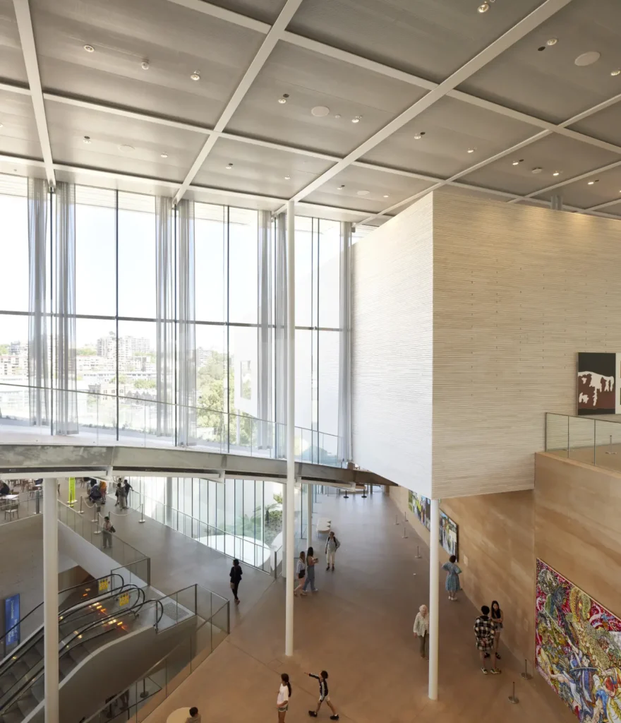 Families viewing art installation on gallery floor at Sydney Modern by SANAA