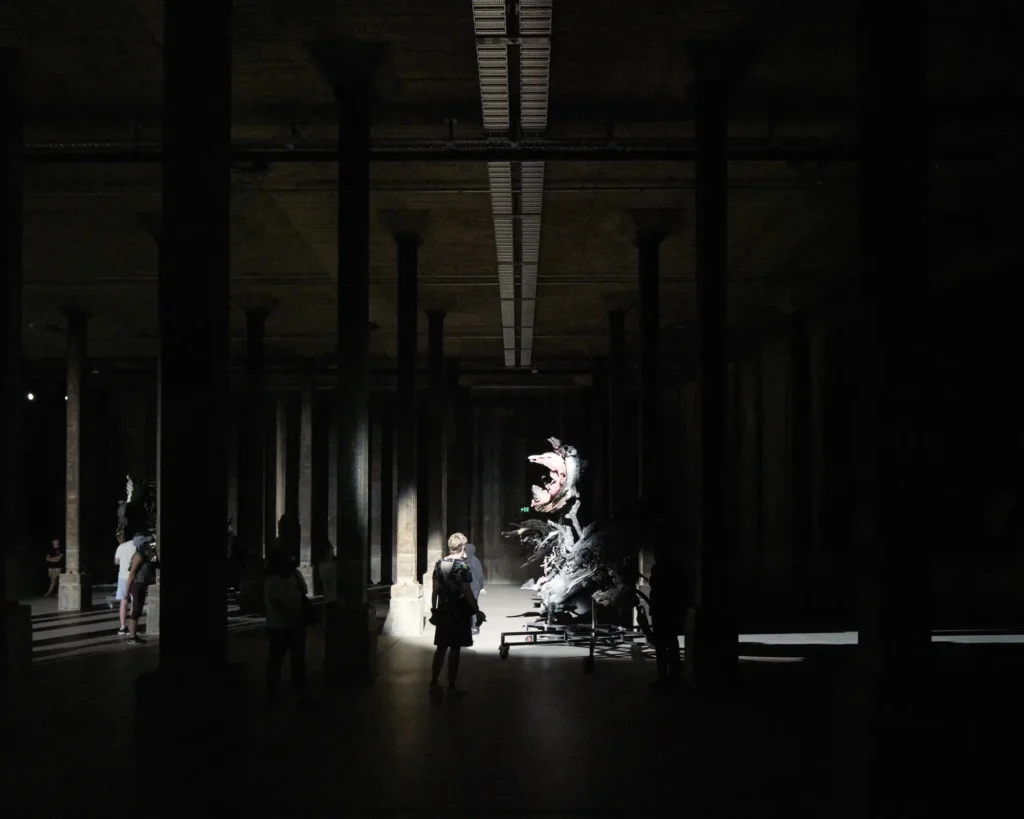 Underground tank gallery with large sculpture installation at Sydney Modern