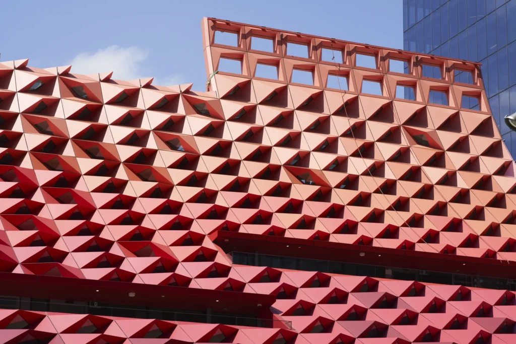 Red metal roof panel detail showing diamond fold pattern at PHIVE Parramatta