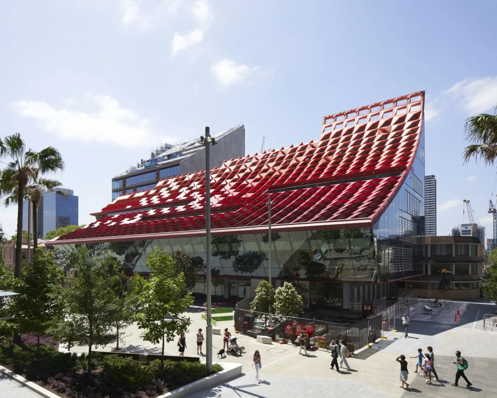 Tree and pedestrians on Parramatta Square with PHIVE roof canopy in background