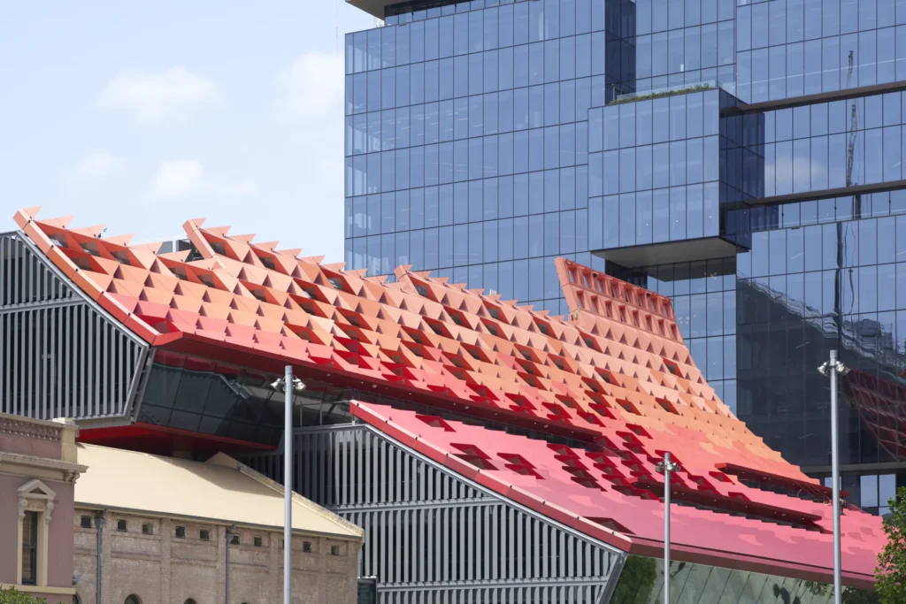 Folded metal roof panels creating three-dimensional pattern at PHIVE Community Center Sydney