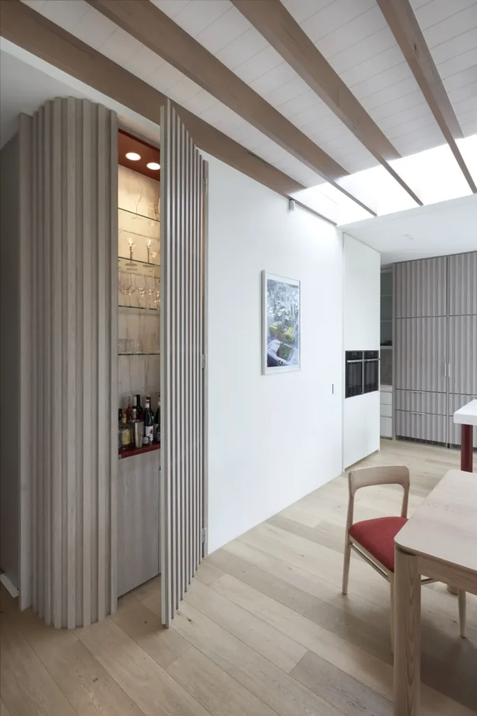 Timber cabinetry and bar area at Lindsay house by Megowan Architectural Melbourne