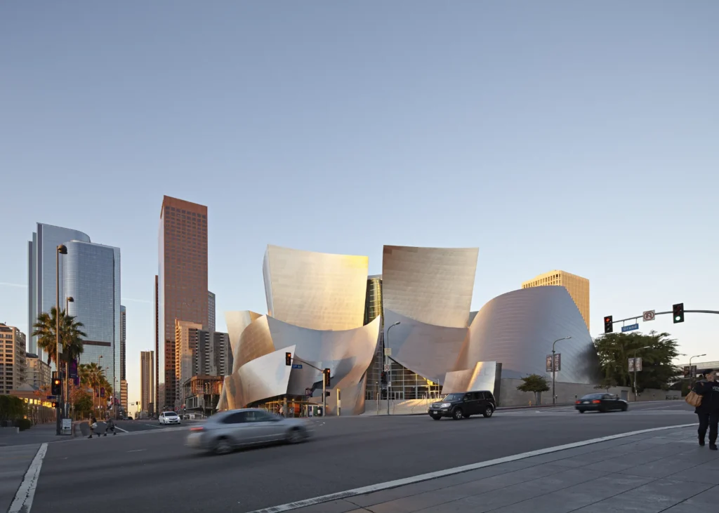 Sunset light on the curved steel forms of Walt Disney Concert Hall by Frank Gehry