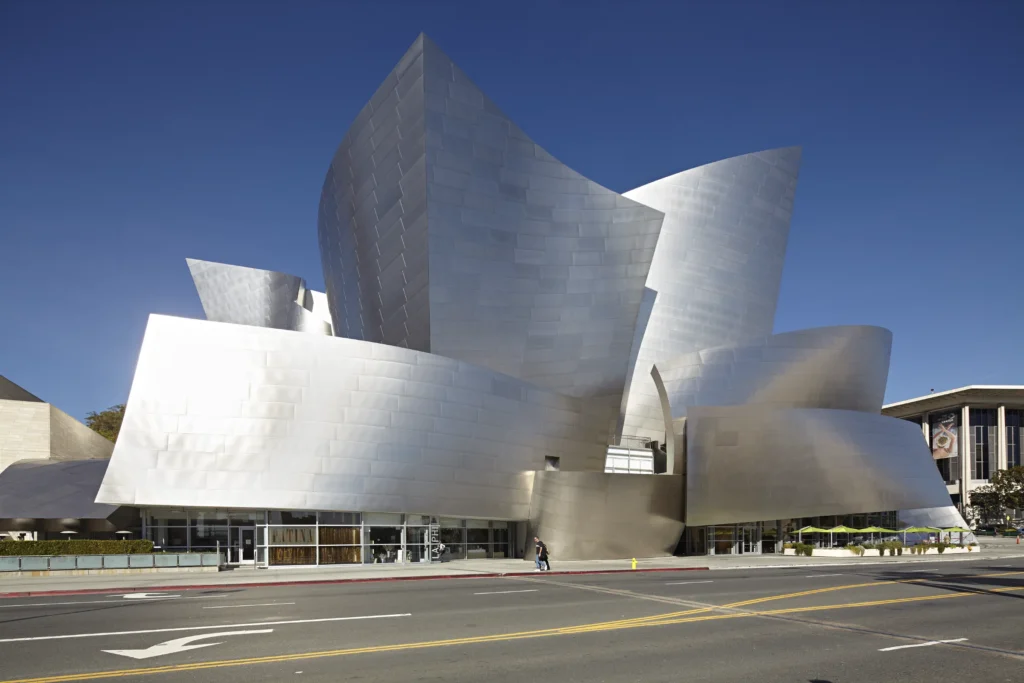 Walt Disney Concert Hall's stainless steel volumes and a deep blue sky in downtown Los Angeles