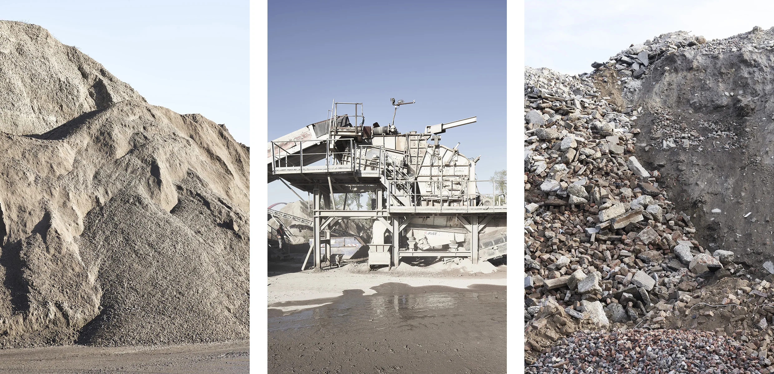 Star wars like steel crusher and mountains of re-used roadbase at REMEX in Essen