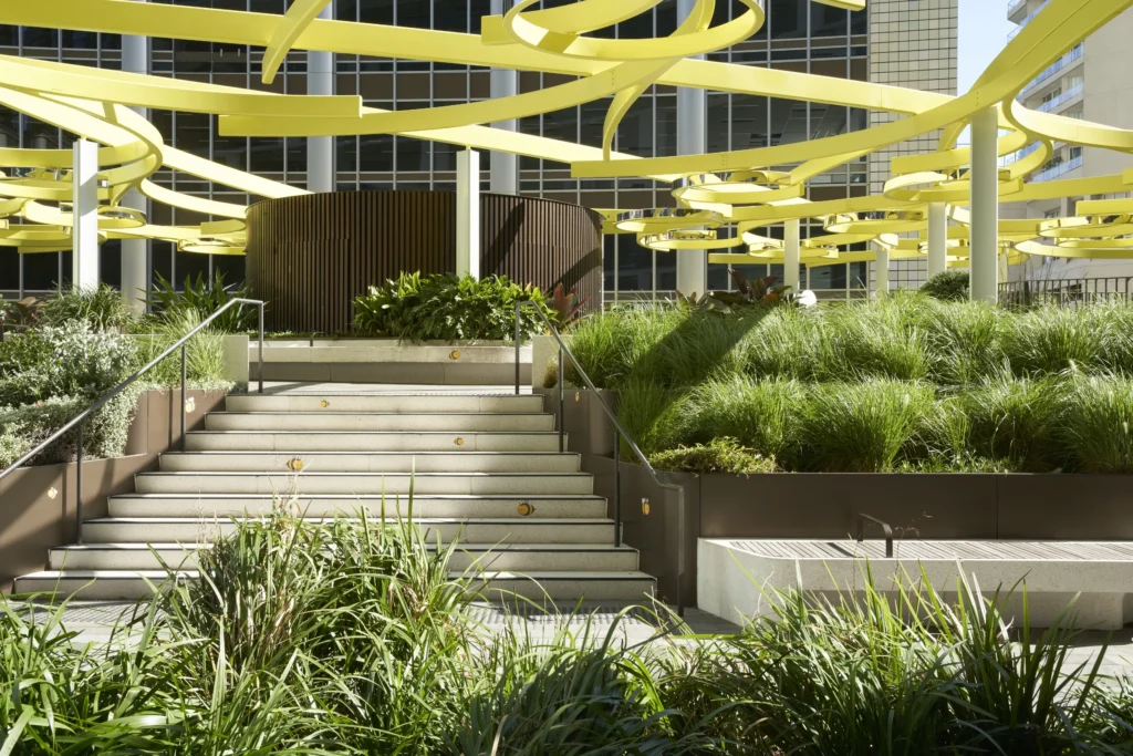 ublic garden terraces with yellow art installation at Quay Quarter Tower in Sydney