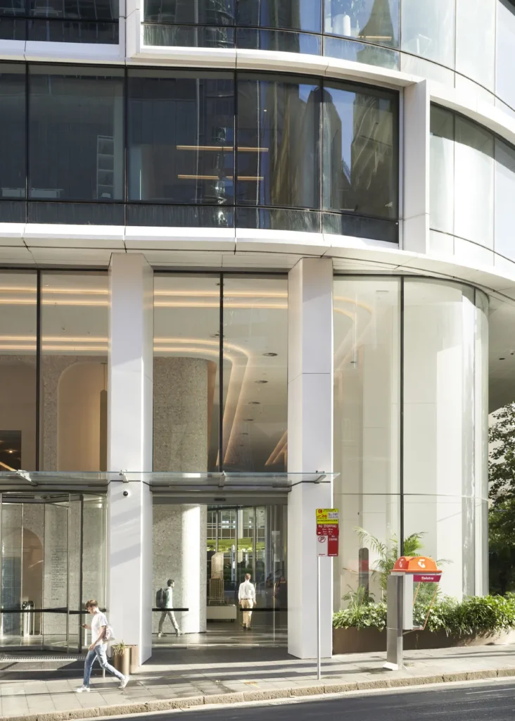 Quay Quarter Tower curved glass facade with retained concrete structure from the original AMP building